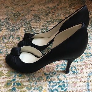 Open toed black pumps